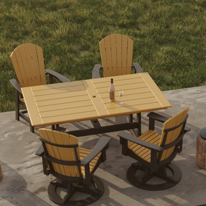 Outdoor patio set with dining table and swivel chairs on a stone patio.