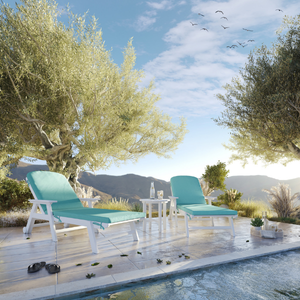 Two white lounge chairs by a pool with trees and mountains in the background