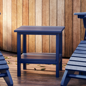 navy blue square table with a wood fencing in the background