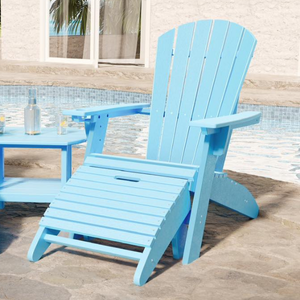 Blue Adirondack chair by a poolside with a neutral background